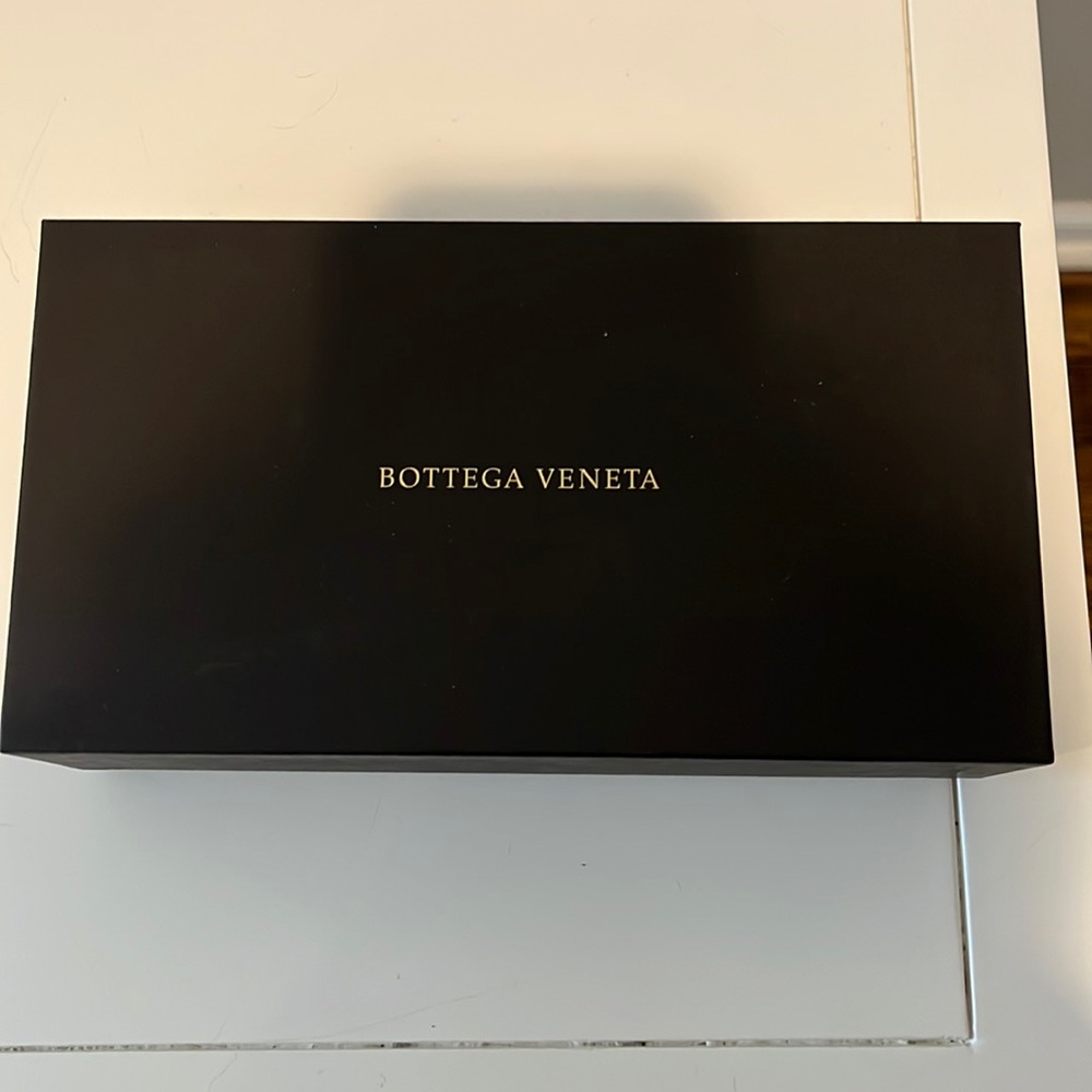 Bottega Veneta sunglasses box with cards and papers